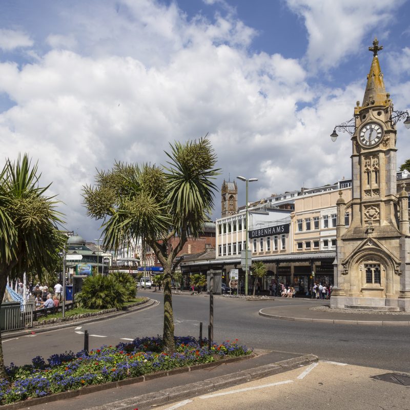 Torquay, England, July 25, 2017; Mallock Memorial Clock Tower on the harbor side in the center of the seaside town of Torquay
